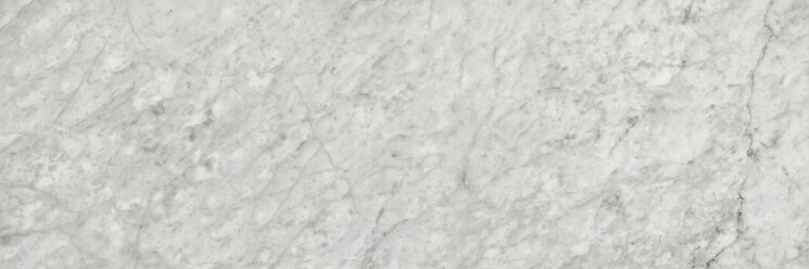 Плитка 10x30 1005608 Carrara Lev/Ret Isla Tiles Selezione Marmi з колекції Selezione Marmi Isla Tiles